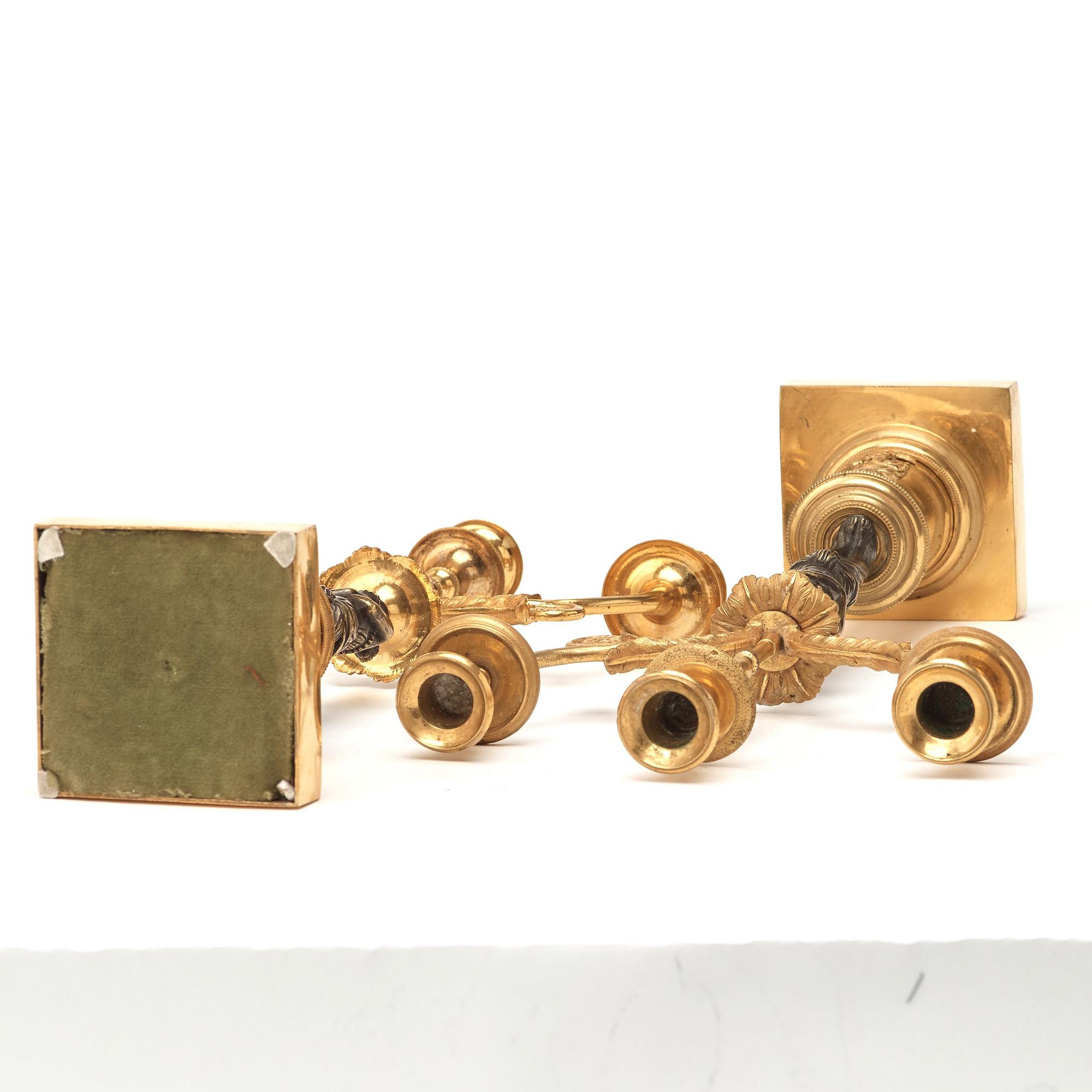 A pair of late Gustavian circa 1800 three-light candelabra.