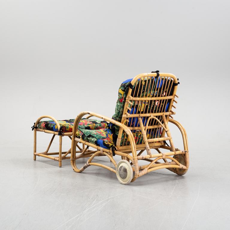 An armchair with ottoman, bamboo and rattan, second half of the 20th century.