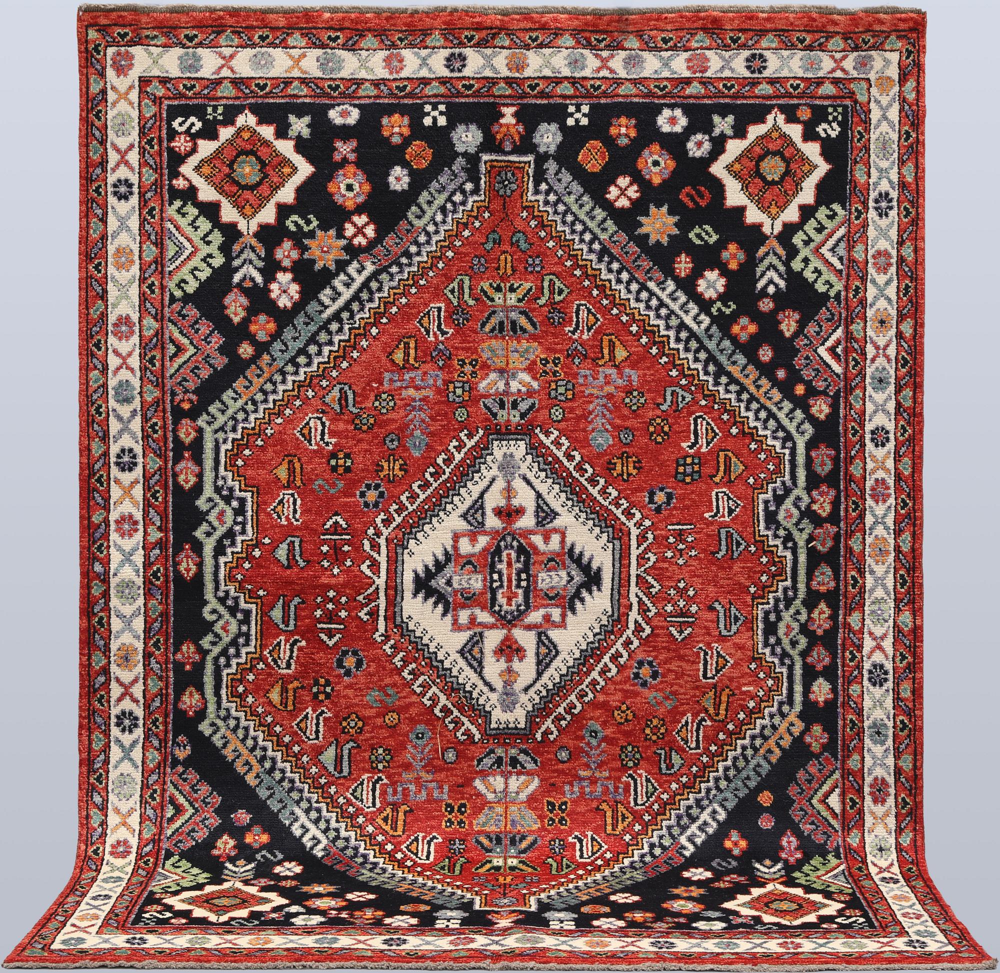 A Shirazi carpet, 237 x 173 cm.
