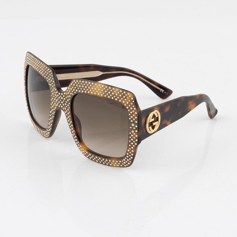 Gucci, a pair of sunglasses, 2016.