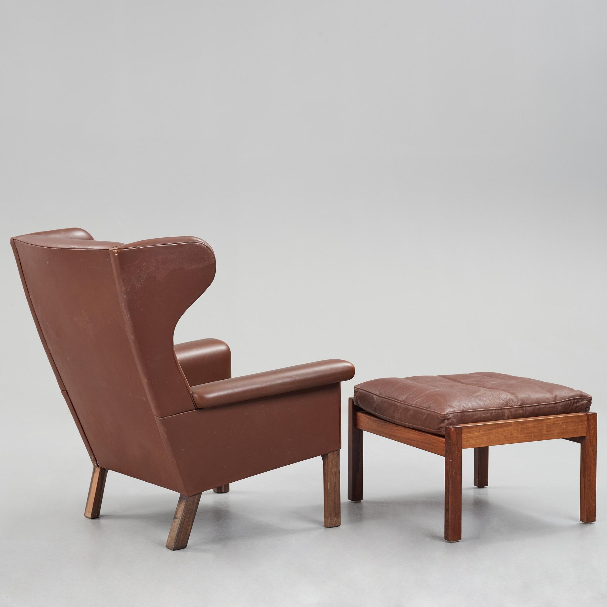 Hans J. Wegner, a pair of "AP-65" easy chairs with stools, AP-stolen, Denmark 1960's.