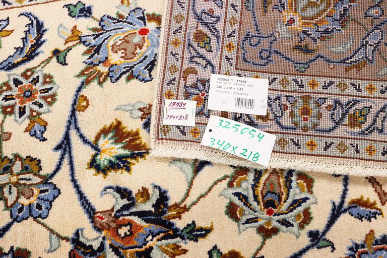 A Keshan carpet, c. 340 x 218 cm.