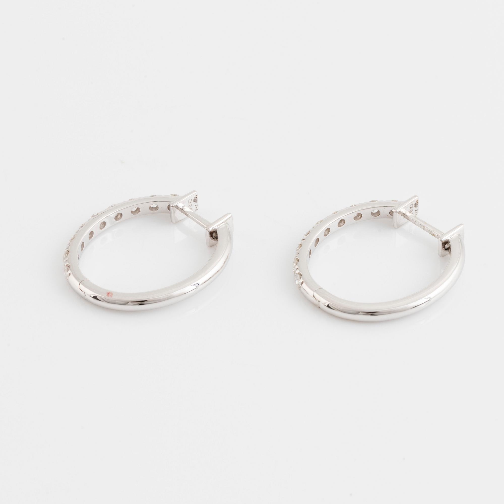 Brilliant cut diamond hoop earrings.