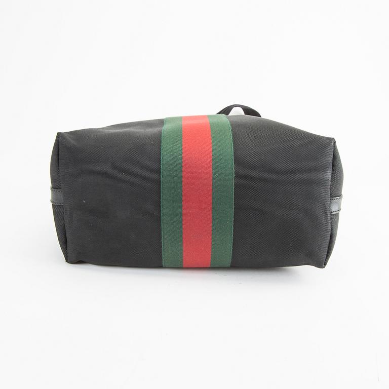 A Techno Web Stripe Canvas Tote  by Gucci.