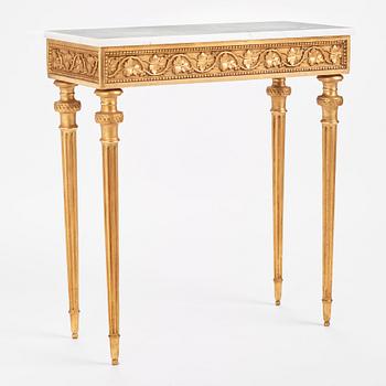 A late Gustavian carved giltwood and marble console table attributed to P. Ljung (1743-1819).