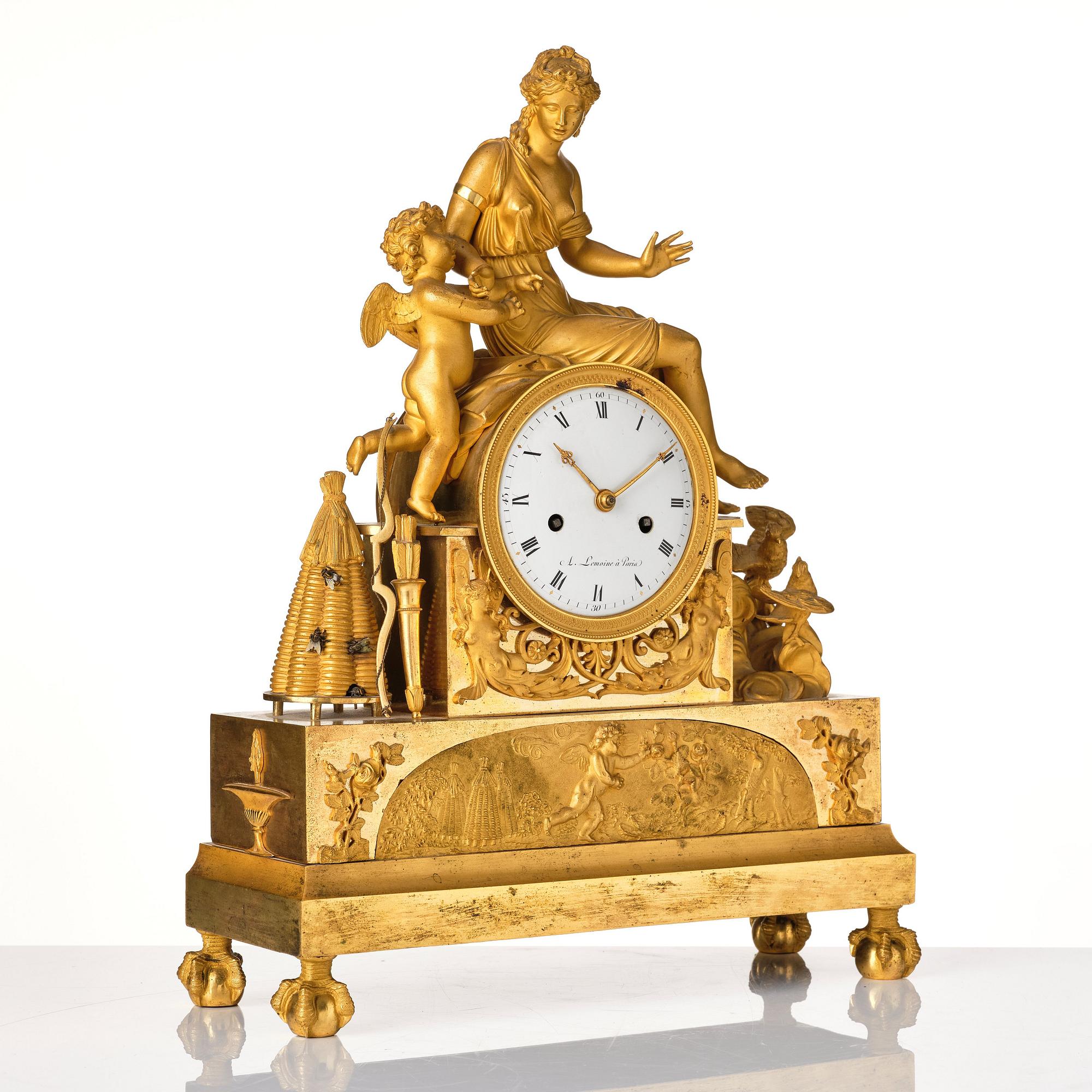 A French Empire mantel clock marked A. Lemoine Paris (1812-1822).