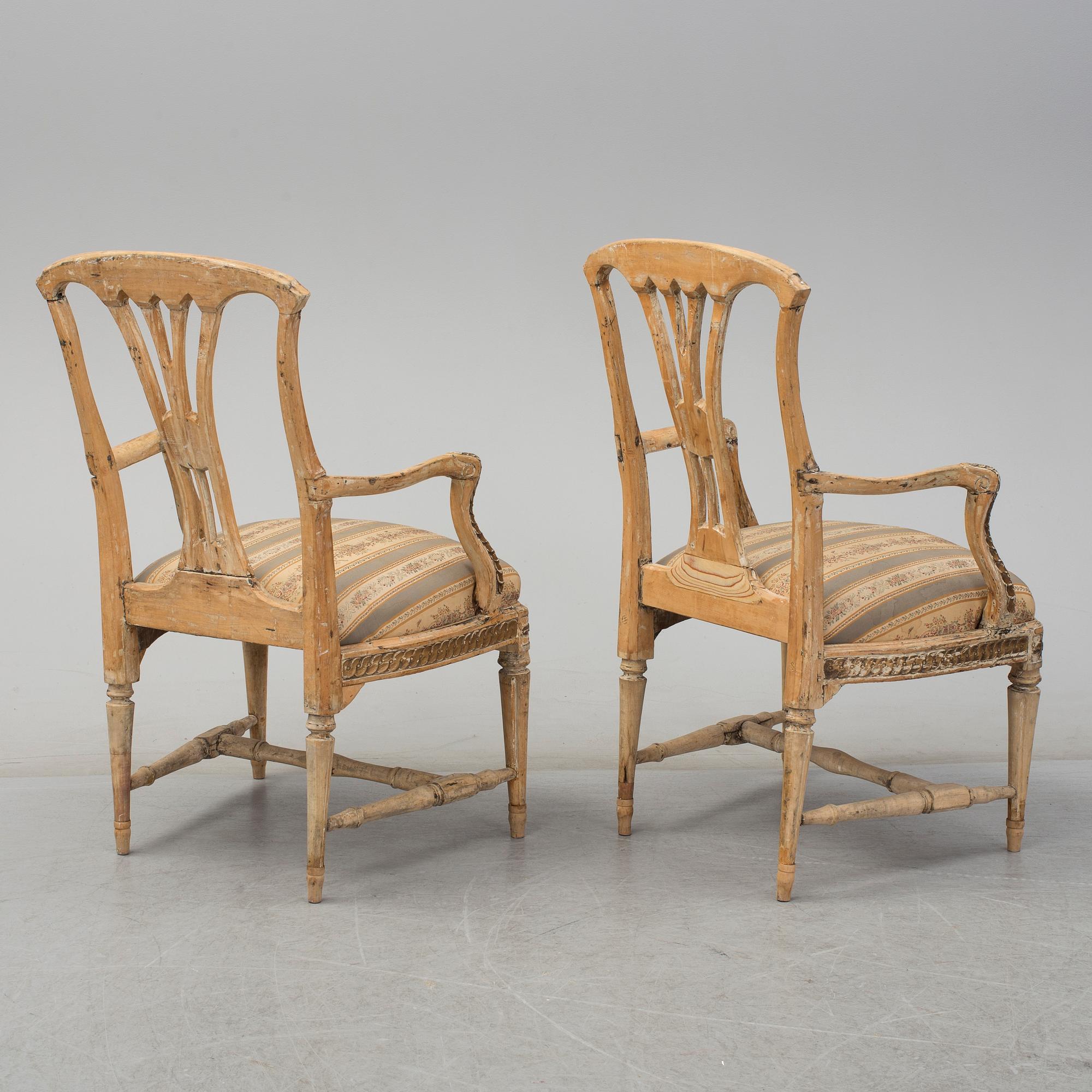A pair of later part of th 18th century Gustavian arm chairs.