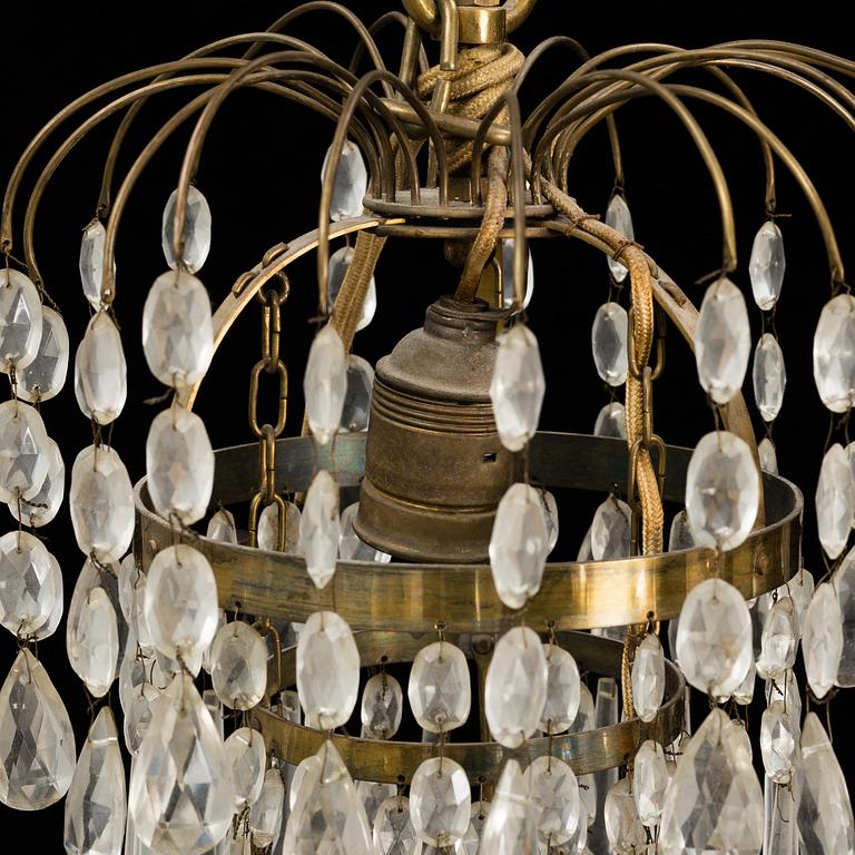 A mid 20th century empire style chandelier.