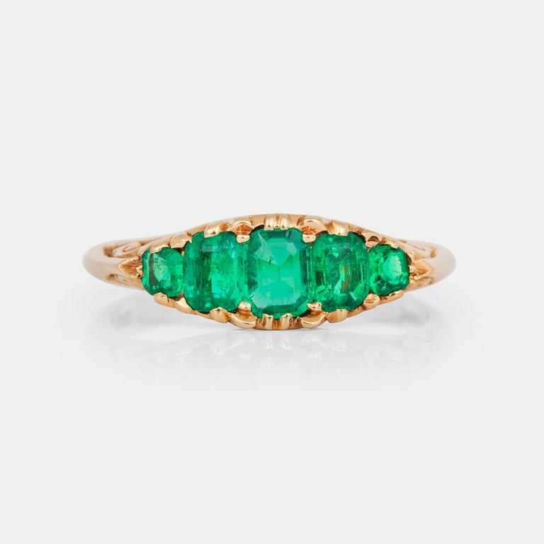 A ring with five step-cut emeralds.
