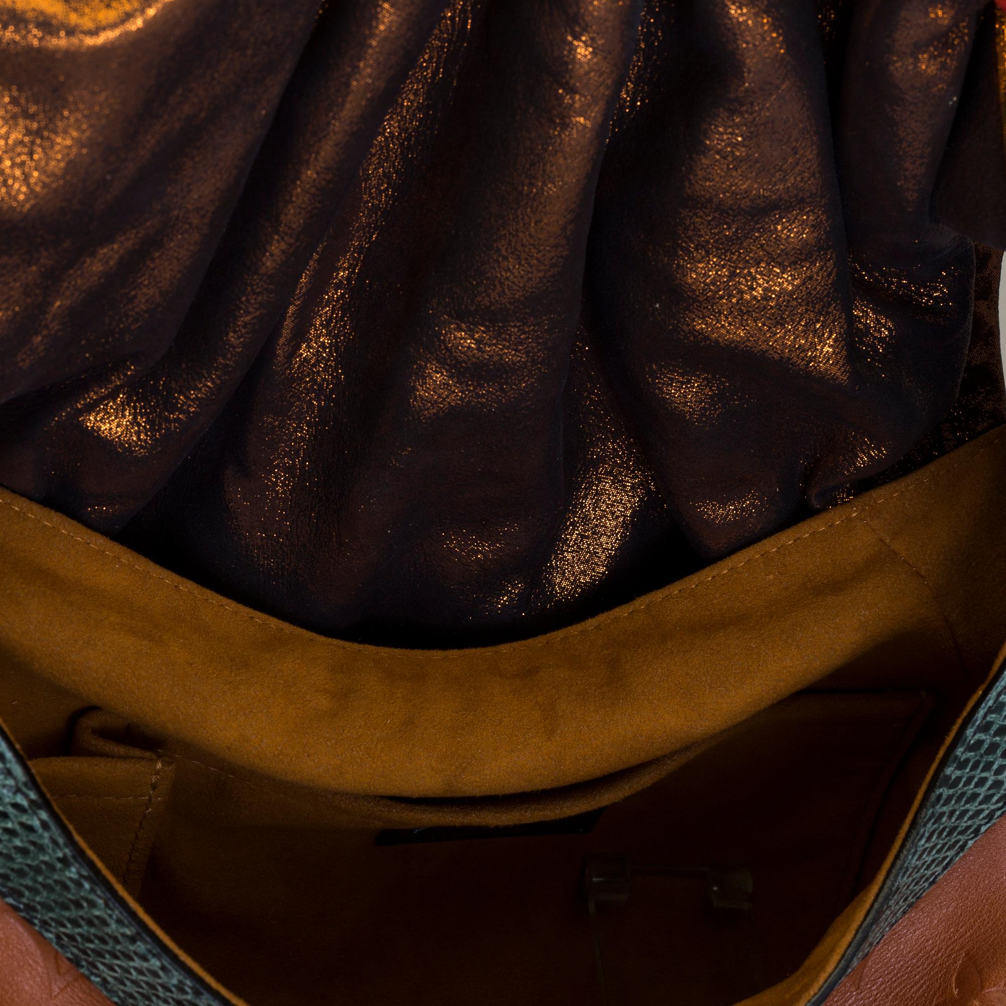 Louis Vuitton Limited Edition Monogram Epices Kalahari GM Bag.