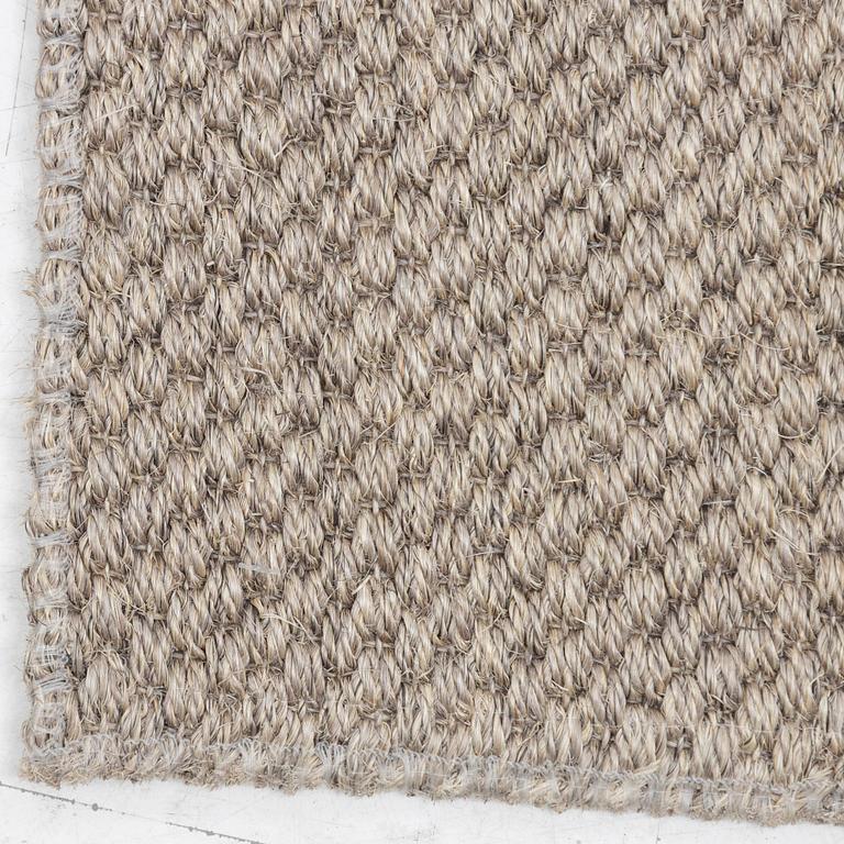 A runner carpet from NTK Atelier, Sweden, c. 448 x 87 cm.