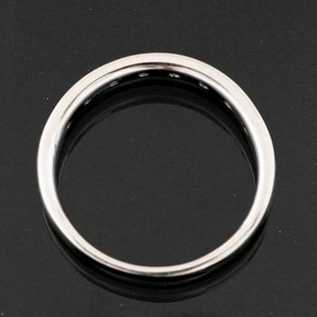 RING, 14K vitguld med 8 briljant och 7 baguettslipade diamanter, ca 0.50 ct. Vikt 4,0 g.