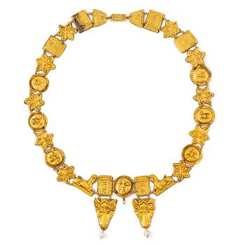 200. A modern Egyptian-style gold and pearl necklace.