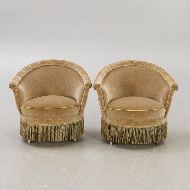 A pair of late 19th century easy chairs.