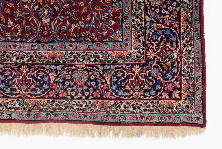 A semi-antique Yazd carpet, c. 292 x 250 cm.