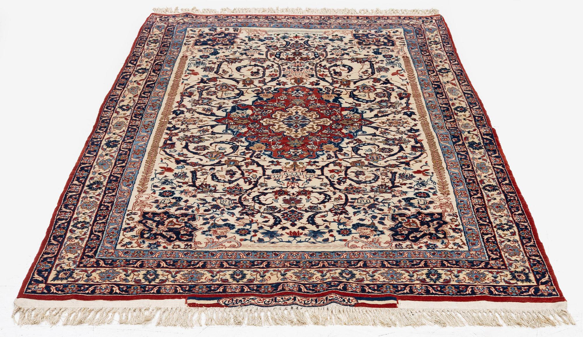 An Isfahan carpet, Central Persia, signed (Hossein) Seirafian, c. 178 x 102 cm.