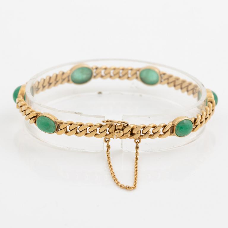 Bracelet in 18K gold with cabochon-cut emeralds, 1920s.