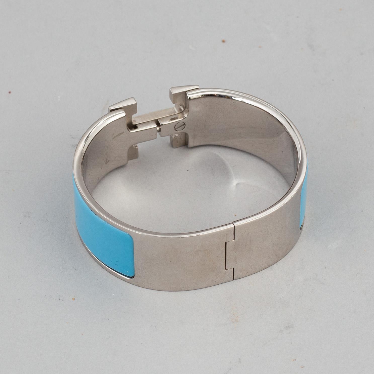 HERMÈS, a 'Clic H' bangle.
