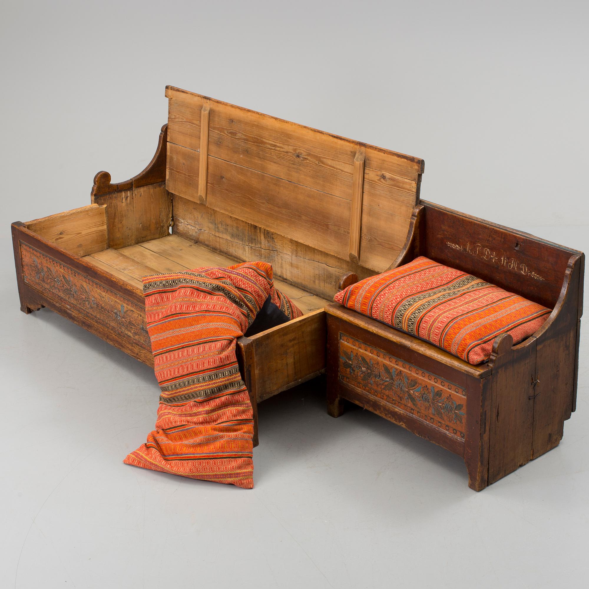 A traditional folk art sofa dated 1852.