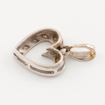 Pendant, in the shape of a heart, 18K white gold with octagonal-cut diamonds.