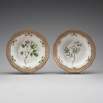 A set of 12 Royal Copenhagen 'Flora Danica' soup dishes, Denmark, early 20th Century.