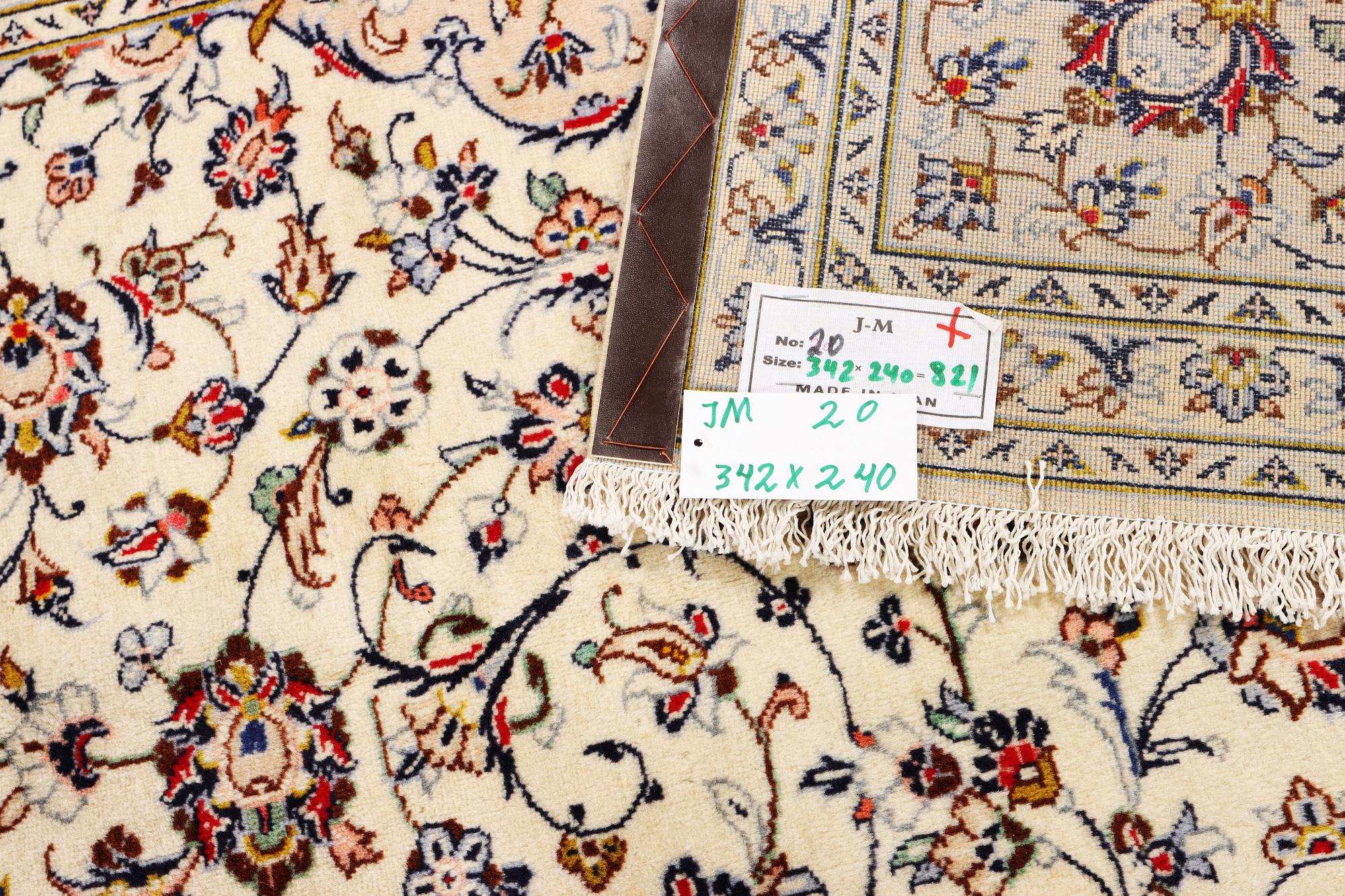 A Keshan carpet, c. 342 x 240 cm.