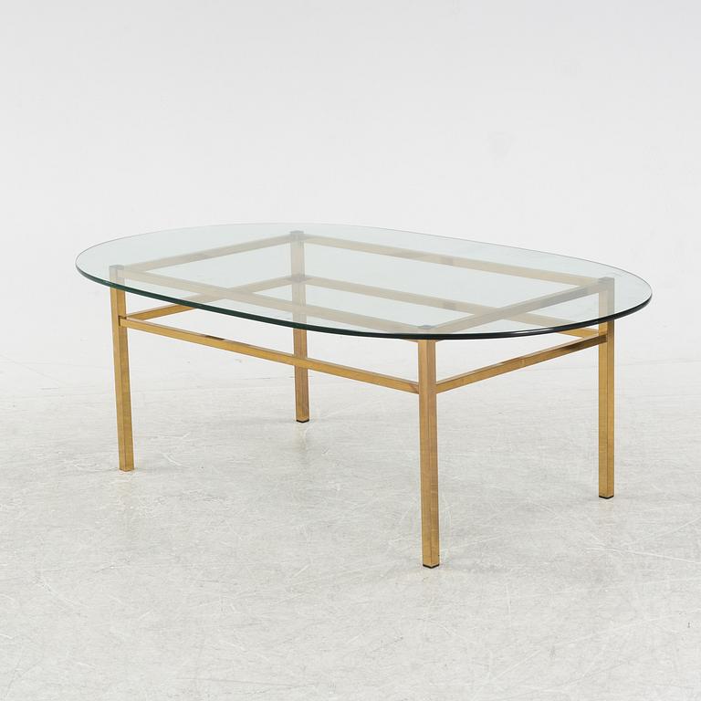 A glass and brass coffee table, Engelsson, Sweden, 21st century.