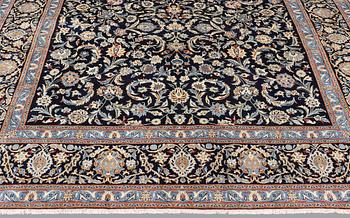 A carpet, Kashan, ca 355 x 238 cm.