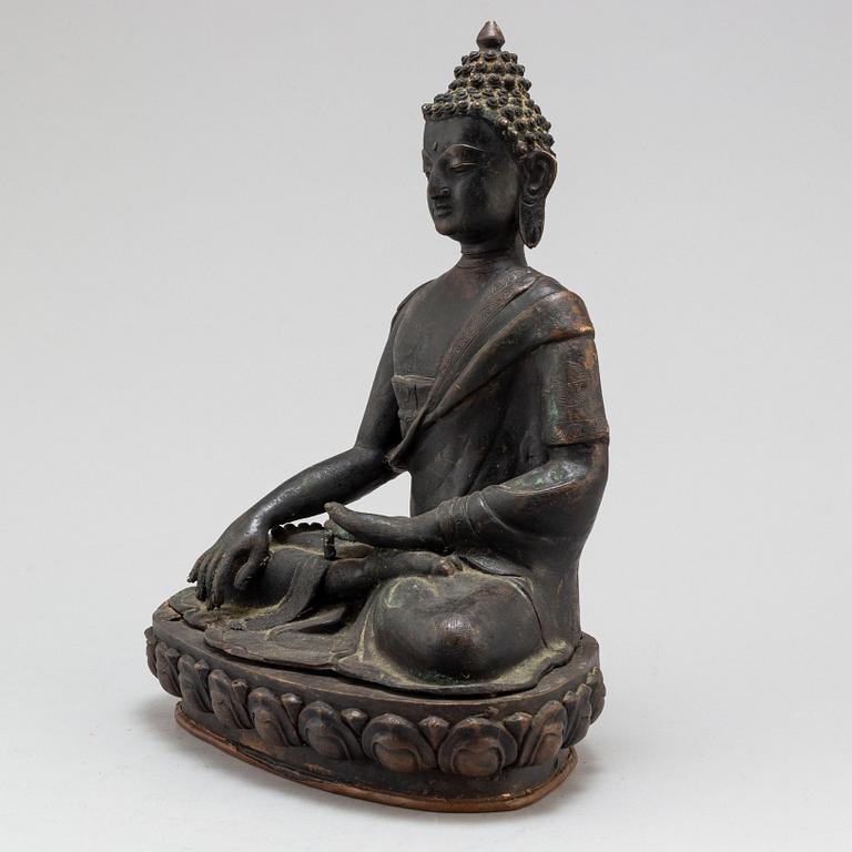 A Thai bronze buddha, 20th century.