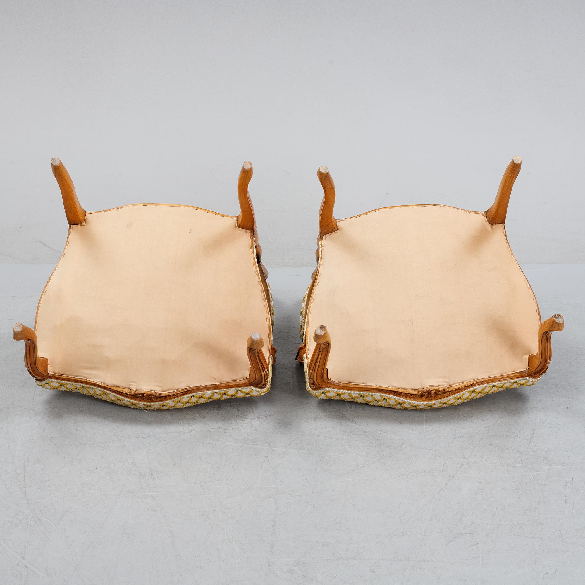 A pair of rococo style armchairs, early 20th Century.