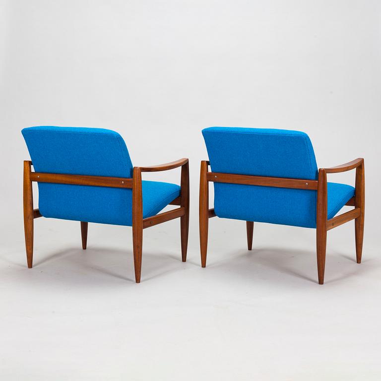 A pair of 1950's armchairs.