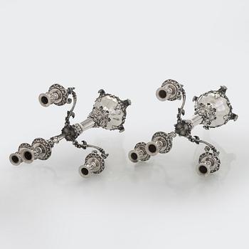 A pair of silver candelabra, maker marks of Carl Johan Tegelsten, Saint Petersburg 1850.