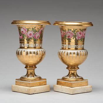 A pair of French urns, 19th Century.