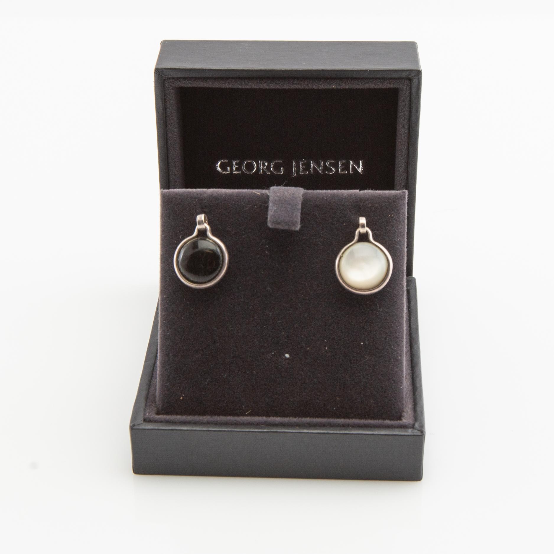 Vivianna Torun Bülow-Hübe, Necklace with pendant and a pair of earrings by Georg Jensen, Denmark, sterling silver and stone.