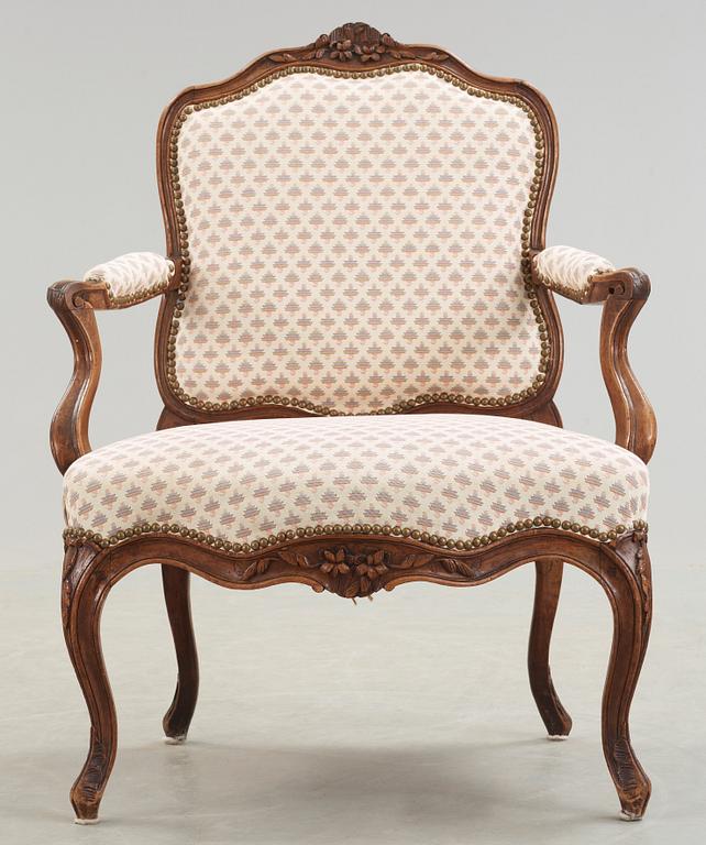 A Louis XV 18th century armchair.