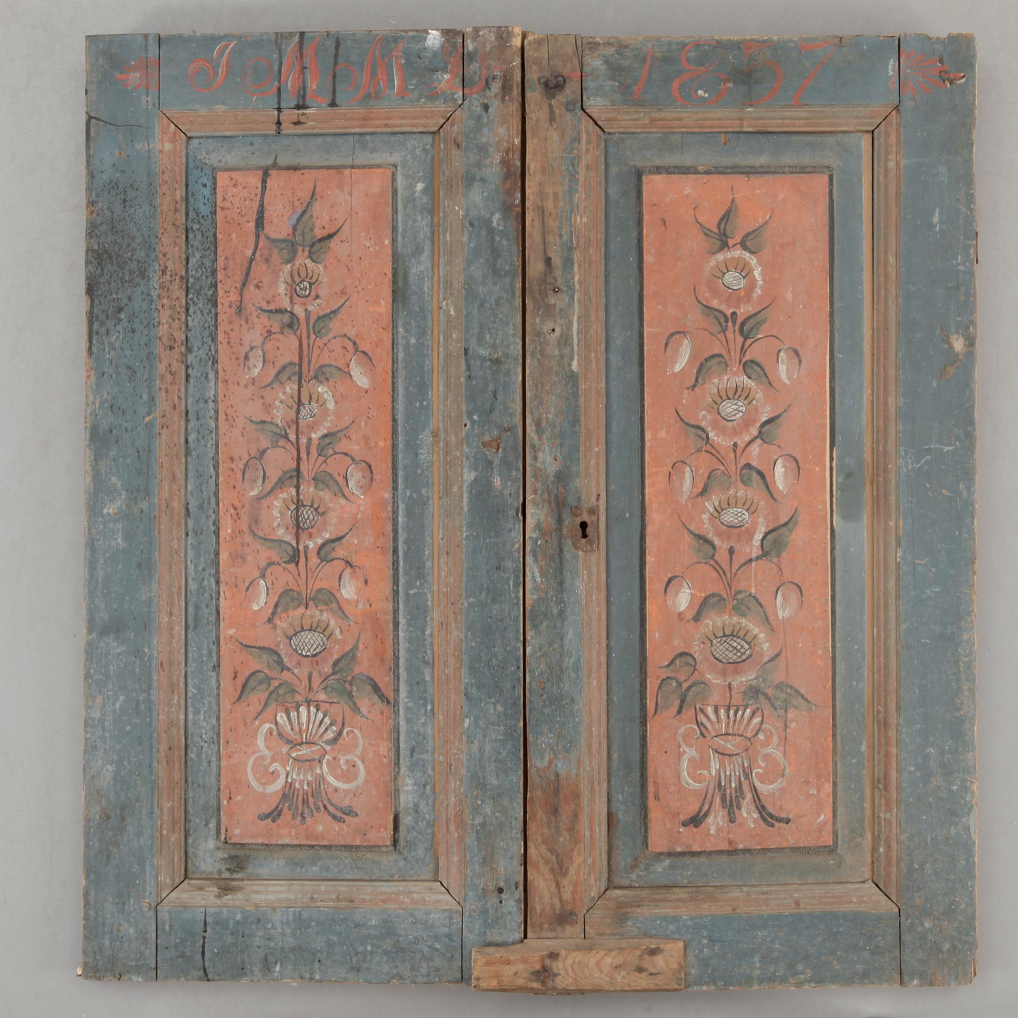 DÖRRAR, ett par, allmoge, Ljusdal, Hälsingland, bär datering 1857.