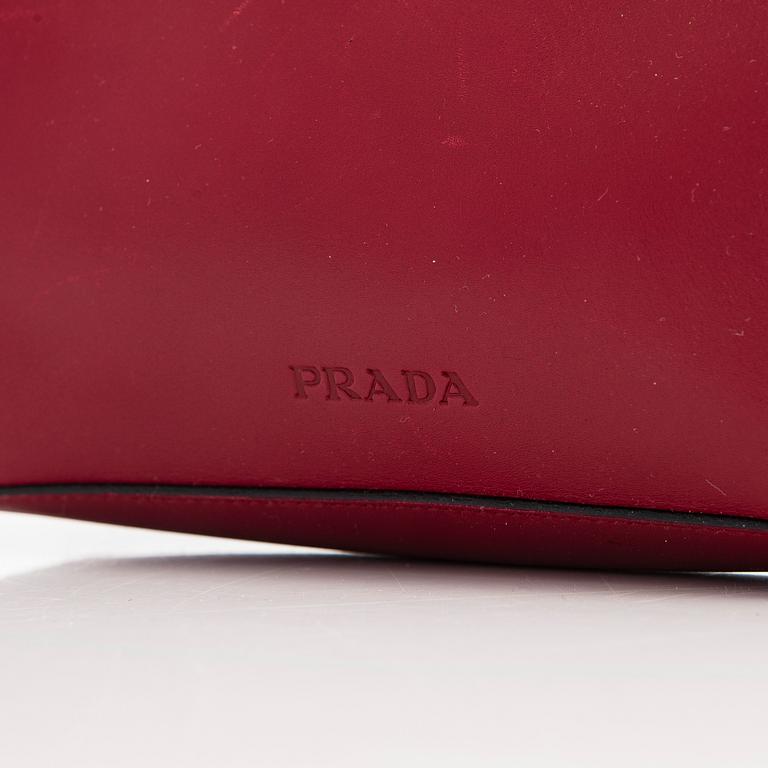 Prada, a leather minibag.