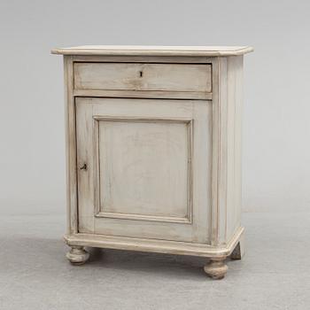 A cabinet, circa 1900.