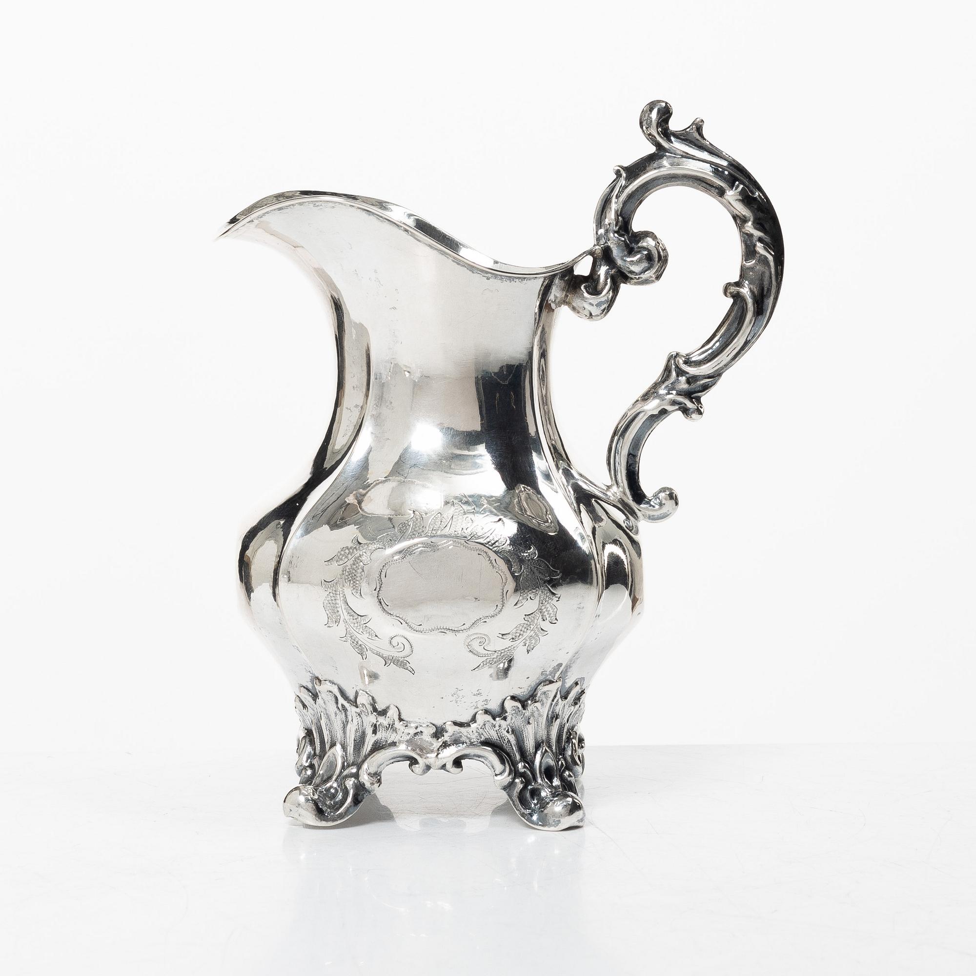 A silver soup ladle and creamer, Sweden, 1867-1905.