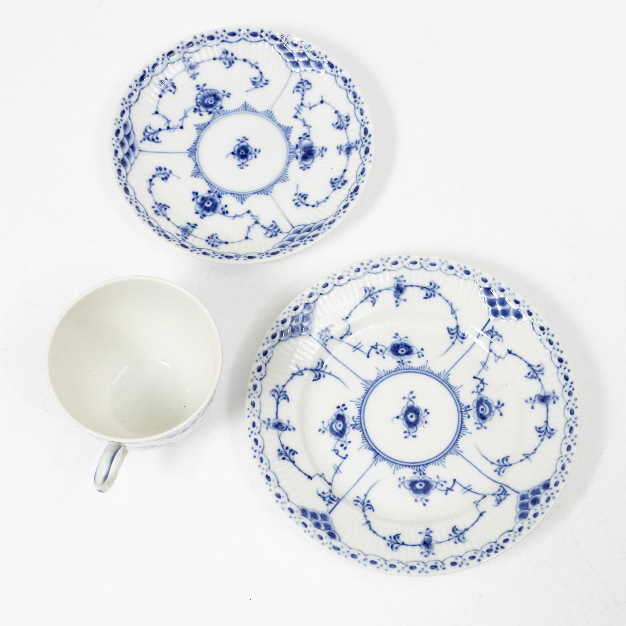 Royal Copenhagen, A 28-piece half lace porcelain servicem 'Blue Fluted', Denmark, 1960-68.