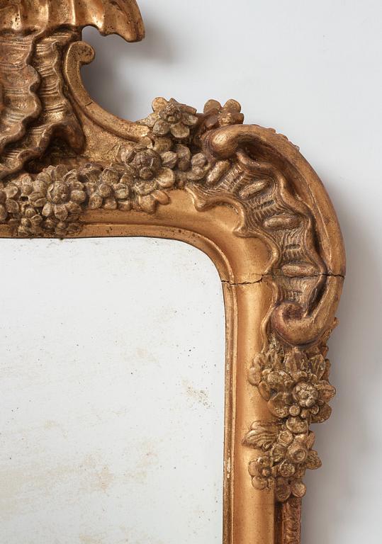 A Swedish Rococo mirror in the manner of Carl Hårleman, circa 1760.