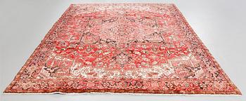 A Heriz rug, 323 x 264 cm.