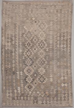 A kelim rug, ca 292 x 195 cm.