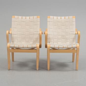 a pair of "Mina" armchairs by Bruno Matsson.