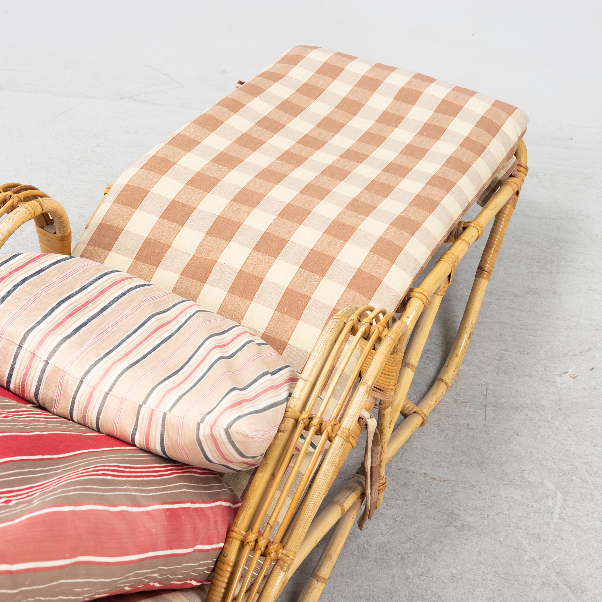 A rattan lounge chair from the secnd half of the 20th century.