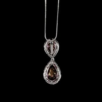 PENDANT, drop cut pink topaz with brilliant cut diamonds, tot. 0.32 cts.