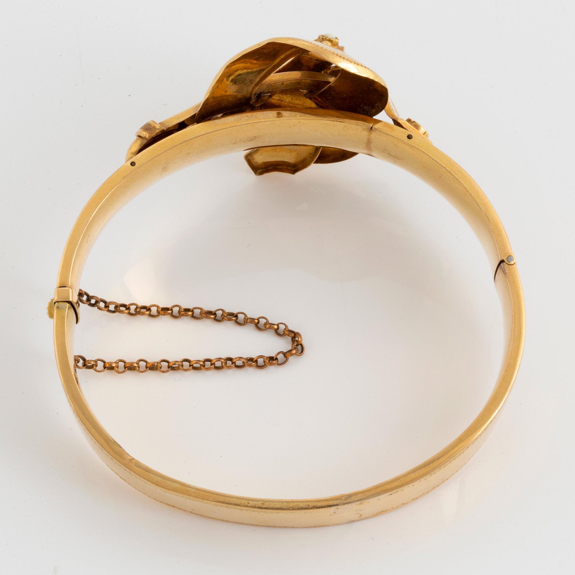 Gustaf Dahlgren armband 18K guld med pärlor.