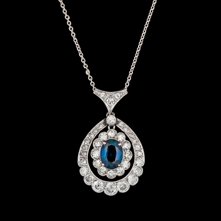 HÄNGESMYCKE, blå safir med gammal- och åttkantslipade diamanter, tot. ca 0.90 ct, ca 1925.