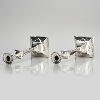 A pair of silver candlesticks, marks of John Parsons & Co, Sheffield, possibly 1784-85.