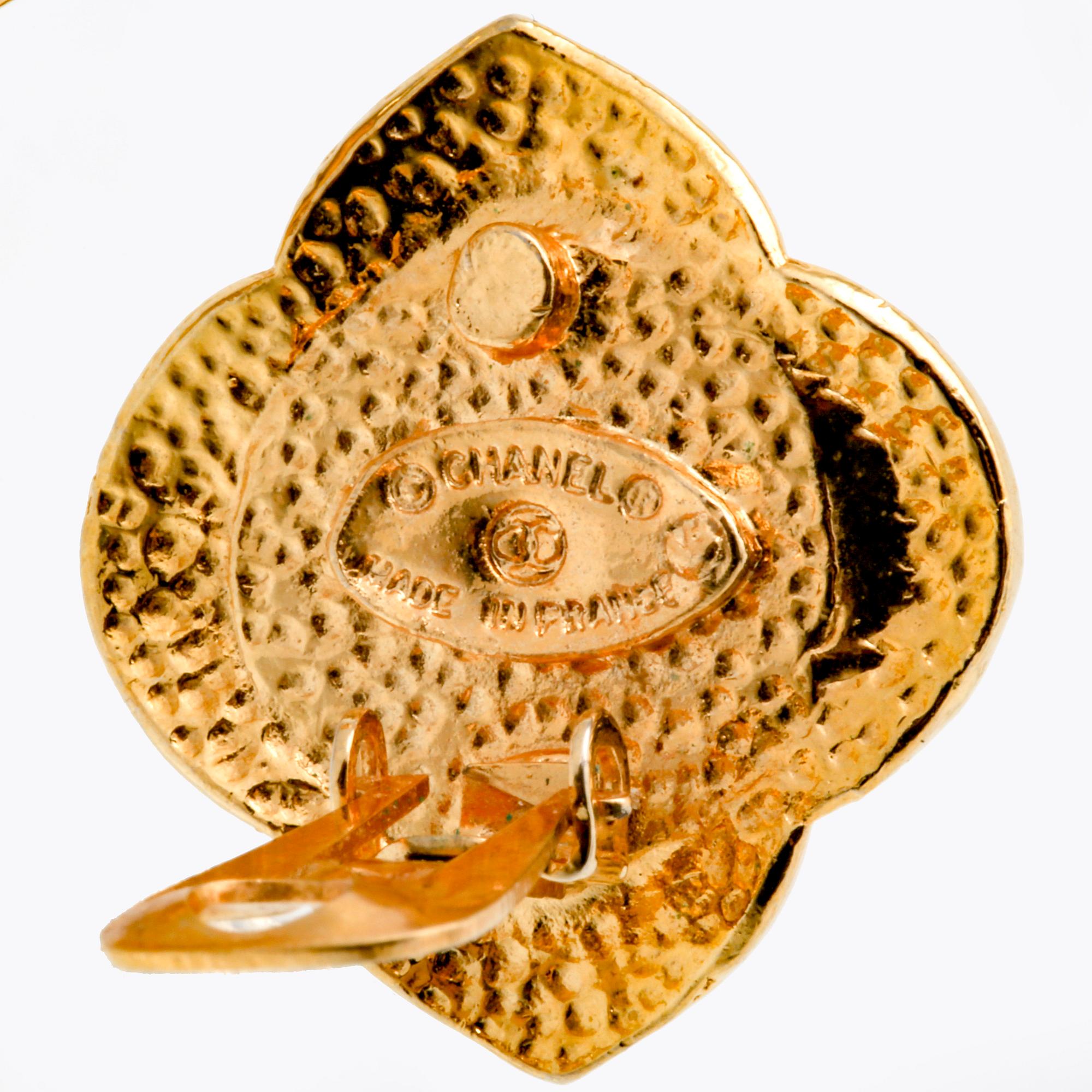 Chanel, earclips, metal, plastic and paste, approx 2,5 cm.